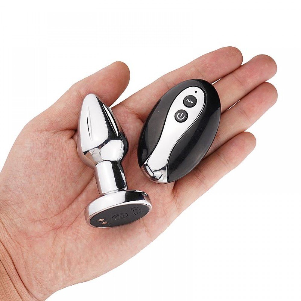 PLUG EM ACO COM VIBRO E CONTROLE 8641 Plug Anal com vibro - Utiliza vibração como forma de estímulo, fazendo você sentir novas sensações. PLUG EM ACO COM VIBRO E CONTROLE 8641