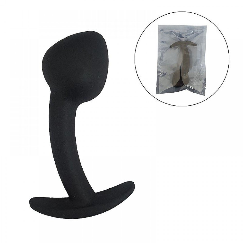 PLUG ANAL CURVADO EM SILICONE 7459 Plug anal feito de um material macio e consistente com base que facilita o manuseio. PLUG ANAL CURVADO EM SILICONE 7459