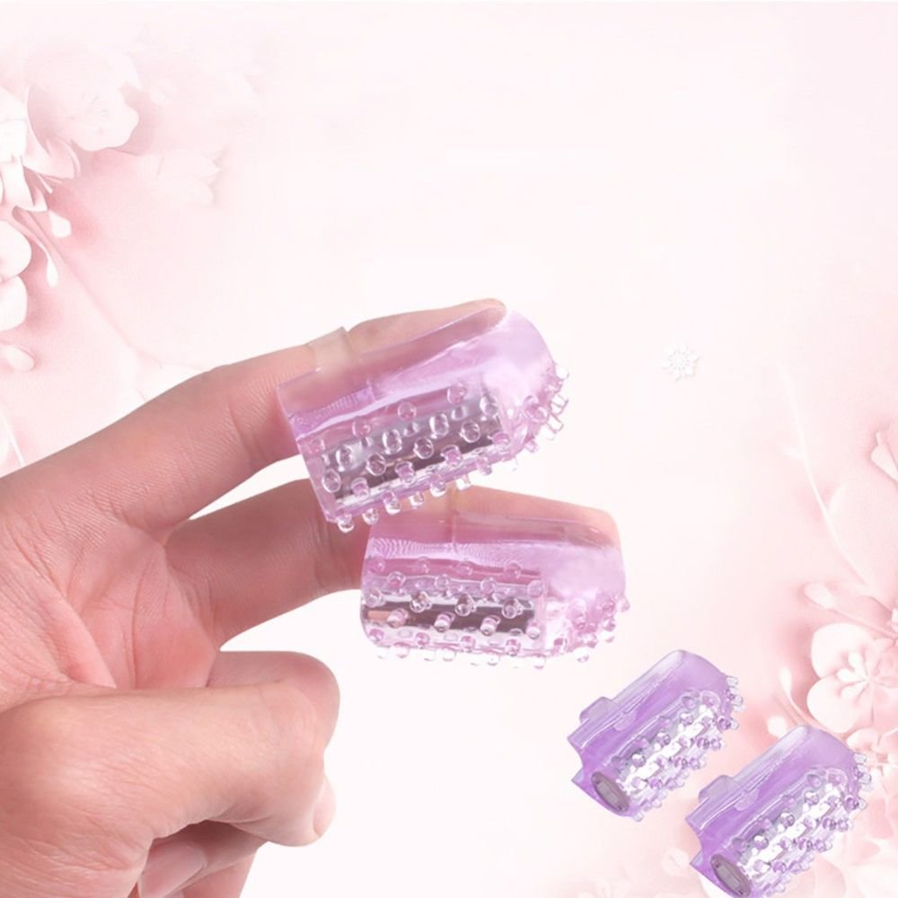 DEDEIRA VIBRATORIA COM SALIENCIAS Mini dedeira com uma única e potente vibração. DEDEIRA VIBRATORIA COM SALIENCIAS