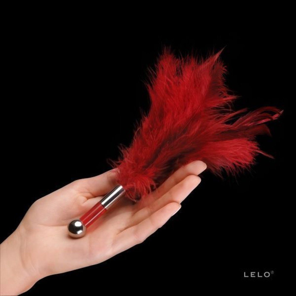 PLUMA SEDUTORA TANTRA- LELO Plumas vermelhas Tantra Featrer Tease com cabo de metal polido e acrílico, ideal para carícias e estimulações no corpo. PLUMA SEDUTORA TANTRA- LELO